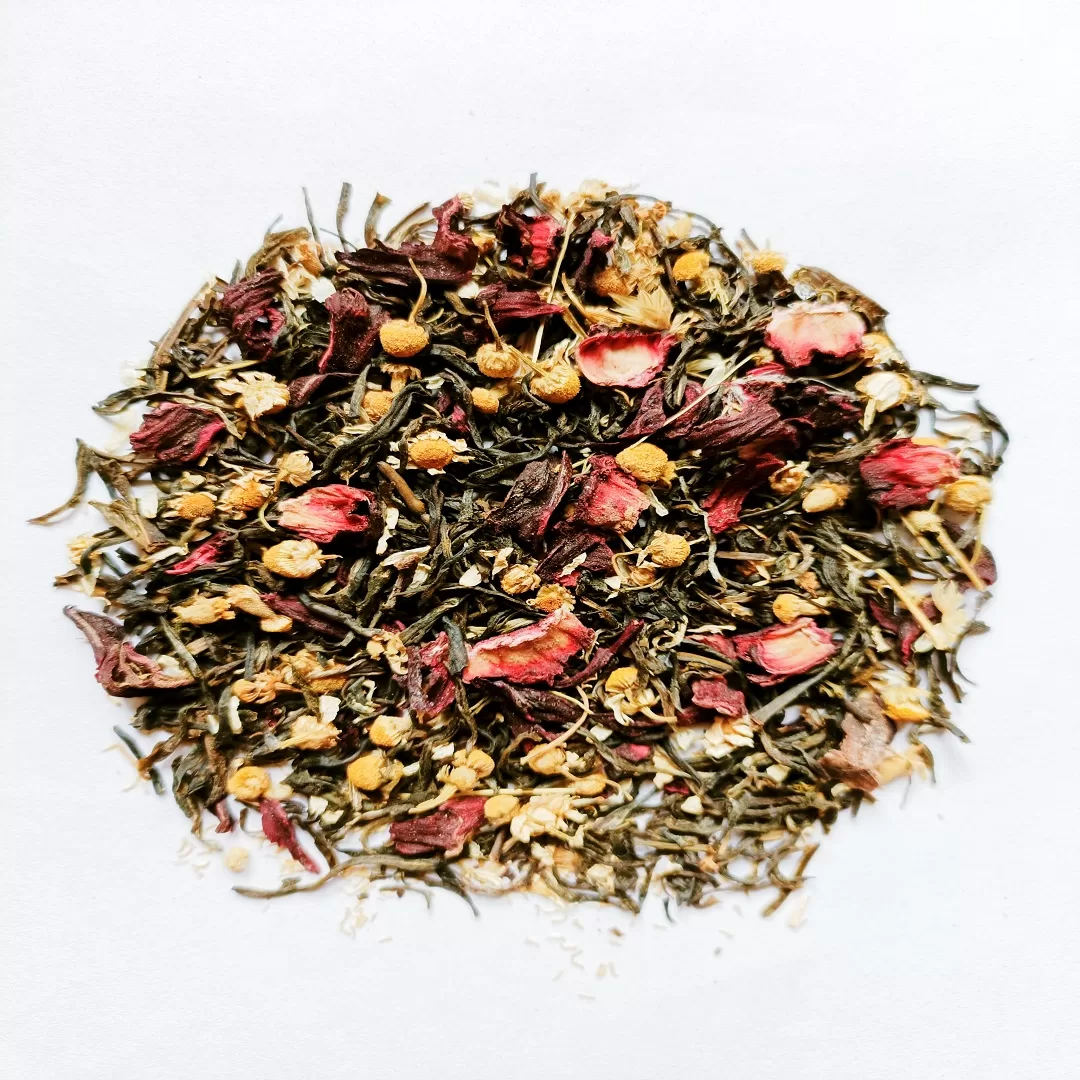 image of ingredients of hibiscus chamomile green tea leaves