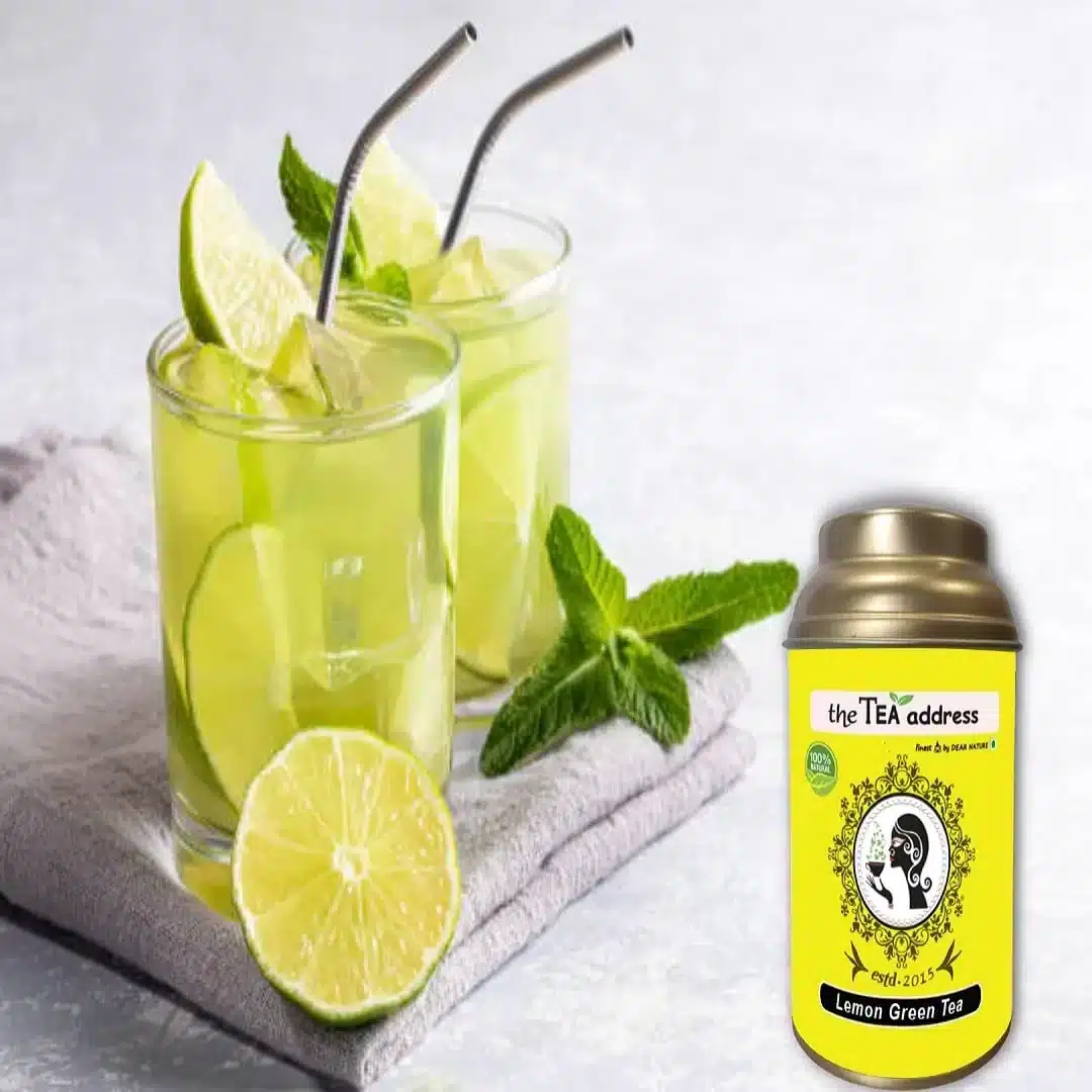 image of lemon green tea in golden tin caddy arrangement