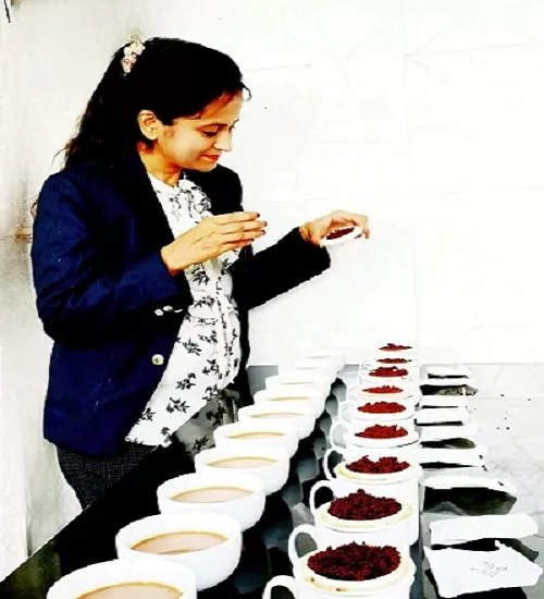 image of the founder doing tea tasting