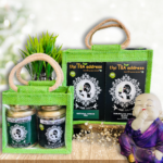 Eco jutebag combos of tins and teabags of darjeeling special black tea and natural green tea